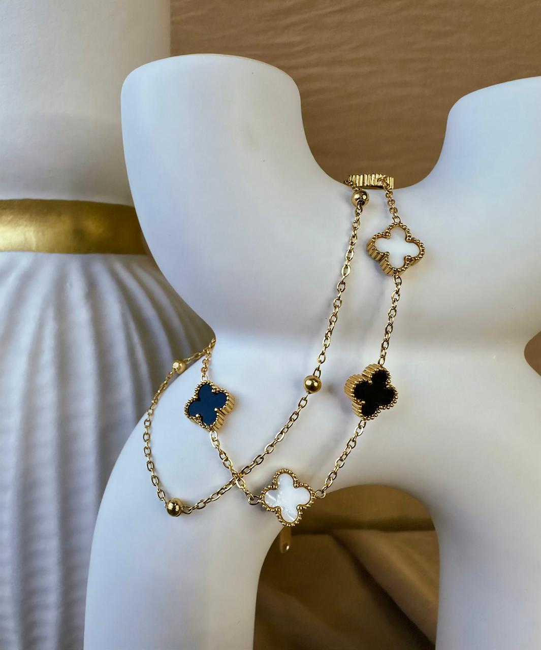 Combo pulsera y aretes trébol